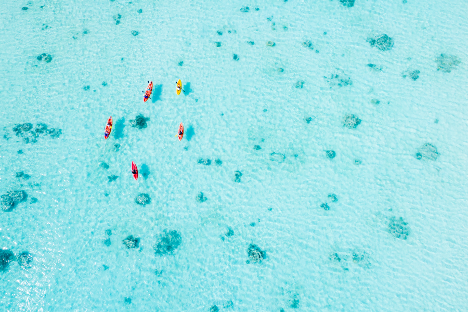 five-kayakers-on-turquoise-lagoon